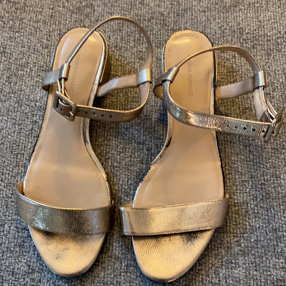 Gold sandal with ankle wrap and 1 inch heel